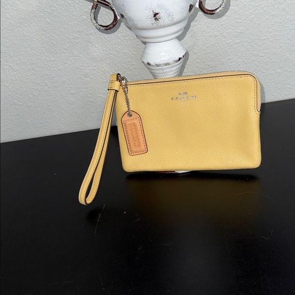 Coach Handbags - Coach Yellow Wristlet EUC